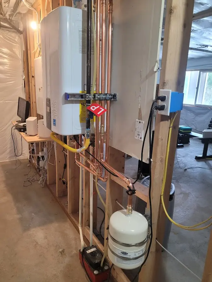 Licensed plumber repairing a kitchen sink in Eagar